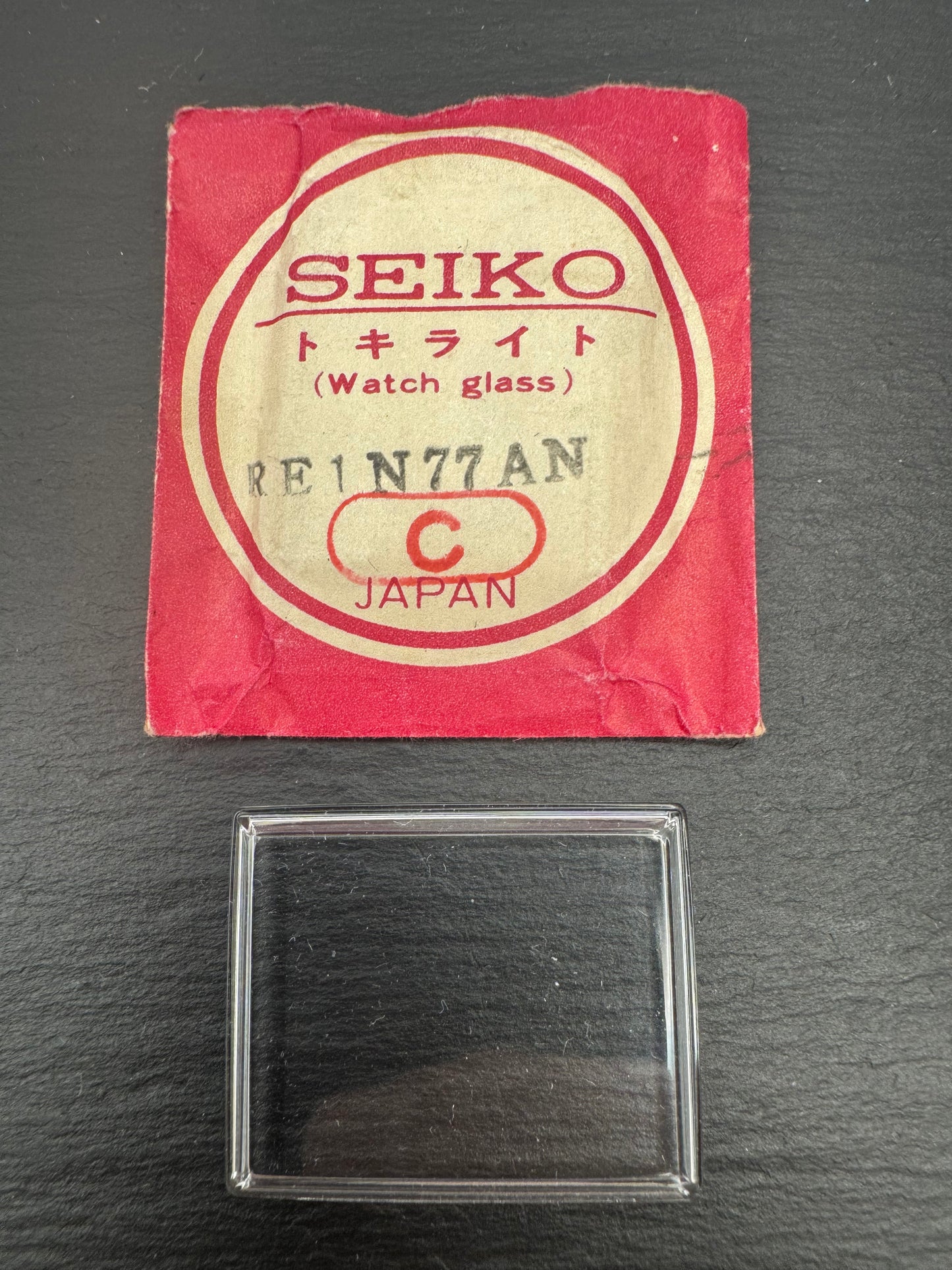 Seiko Tokelaito Crystal RE1N77AN – 25 × 31 mm – Rectangular/Domed – Vintage Watch Glass – NOS