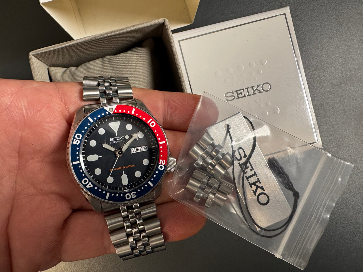 Seiko SKX009K2 Pepsi – mit Seiko-Box und Ersatzgliedern